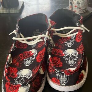 Skulls and roses slip on shoes